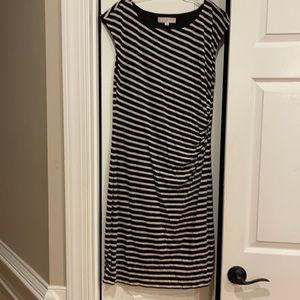 Ann Taylor Loft women’s L, diagonal cream lines on black- side cinch on left